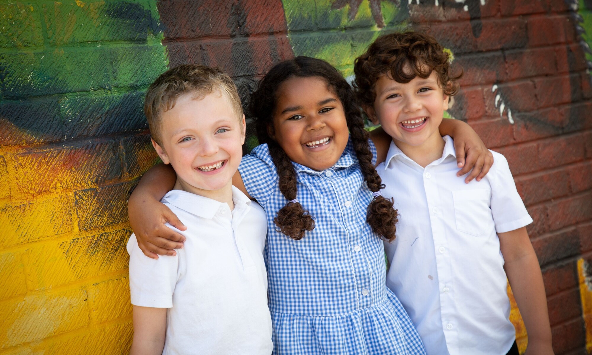 Bearbrook school students together in a three